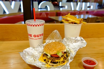 Five Guys expensive burger and fries